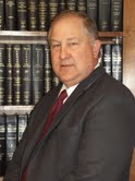 District Attorney Travis J. Koehn